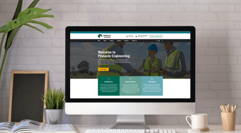 Pinnacle Engineering's new website homepage on a desktop computer.