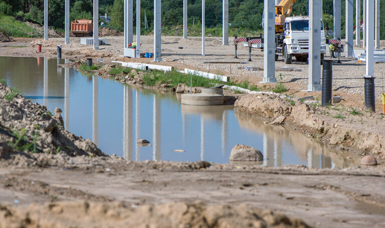 Large pool of standing water on a construction site